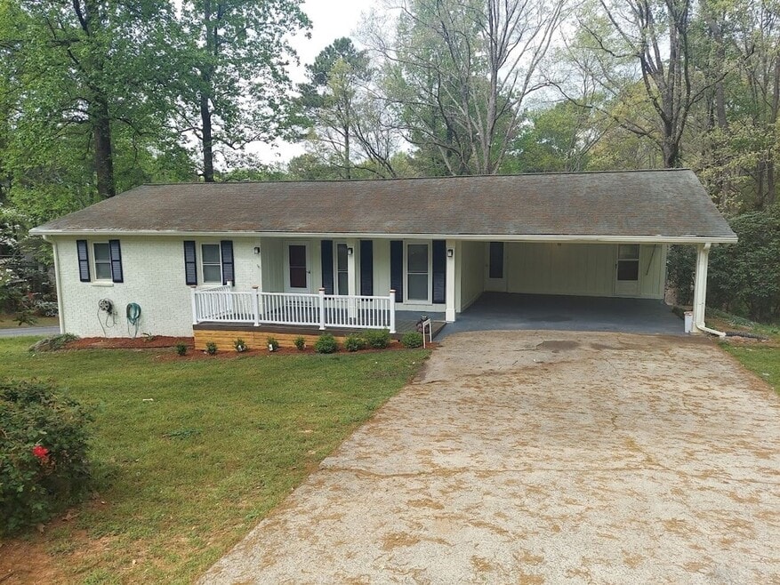 5571 Four Winds Dr SW, Lilburn, GA 30047 - photo 1