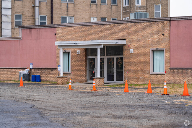 The Entrance to the TET Christian Academy lies behind a gate far into the property of the school