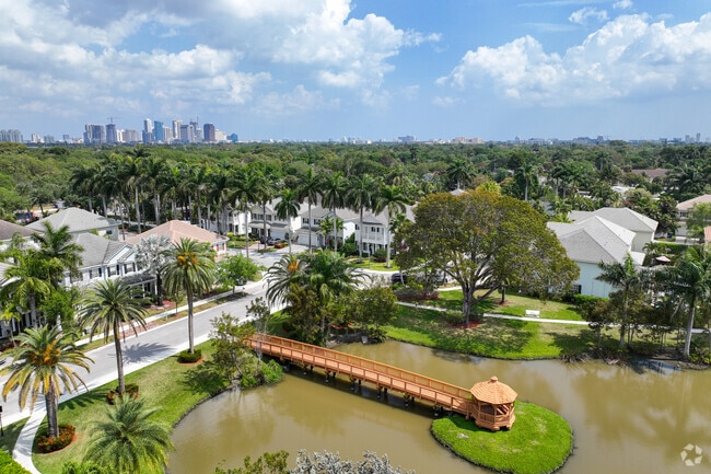Traverse the footbridge over the lake and savor the River Oaks neighborhood views.