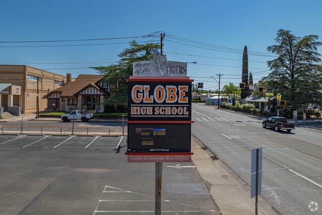A sign for Globe High School greets visitors along the roadside, a symbol of pride for generations of Tigers.