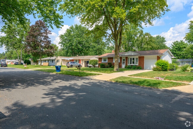A row of ranch homes line a street in the Westwood neighborhood.