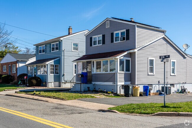 A row of older colonial homes of all sizes line the streets of Milltown, NJ.