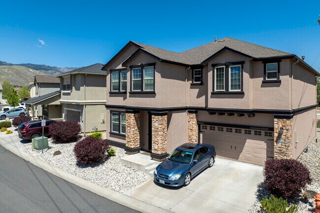 Modern suburban living shines in Capitol Village with these contemporary two-story homes featuring Craftsman-inspired stone columns, stucco siding, and clean architectural lines.
