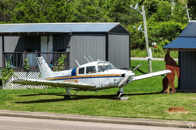 This plane sits off to the side of Maynardville Highway in front of Wyrick Roofing.