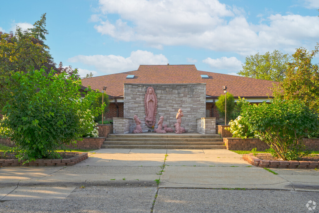 Crescent Academy - High School front statues in Oak Park.