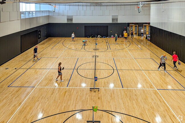 Residents play pickleball at Plymouth Community Center.