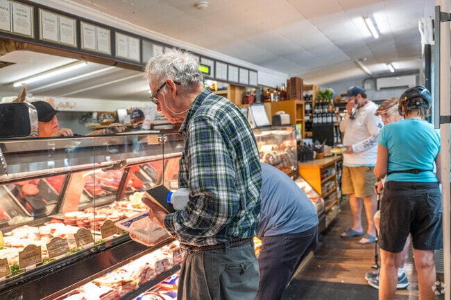Residents live the selection of aged meat from West Falmouth Market.