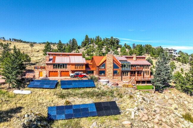 Some modern homes energy needs in Sunshine Canyon are provided by solar power.