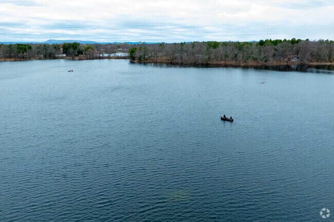 A few fishermen try their luck on Five Mile Pond in Springfield.