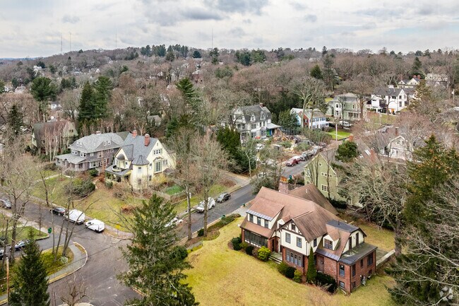 The residential streets of Newtonville are a mixture of multifamily and large single family home