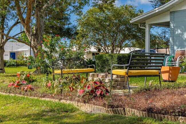 Residents of Crossroads create their own fire pit area.