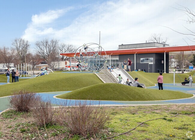 Kids Playing on Playground at Tarkington Park in Butler-Tarkington, IN.