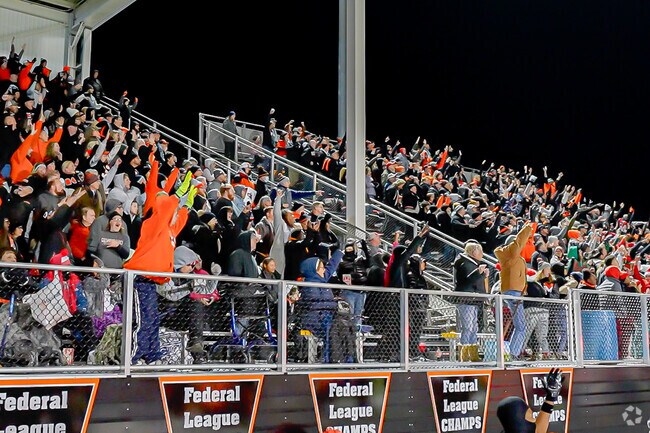 Residents of Lawndale show their tiger pride at one of their local games.