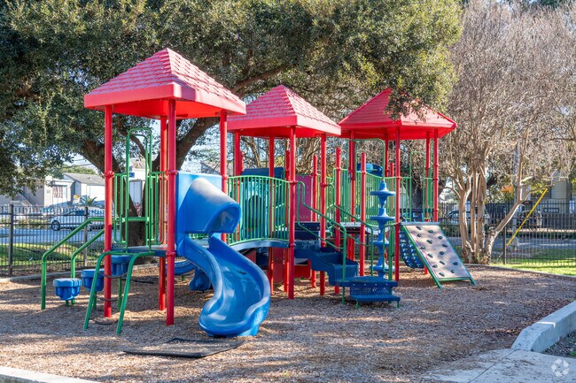 Playground joy resonating from the colorful playset at Judge Bonnie Hellums Pocket Park.