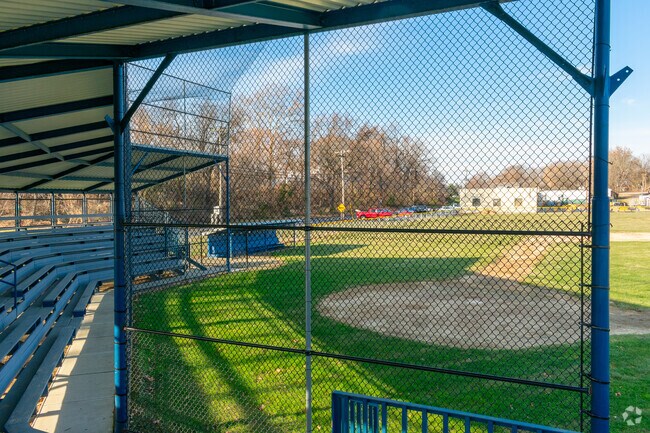John Dolak Ballfield, located in the heart of Alpha, features a well-maintained baseball field that serves as a recreational hub for the neighborhood.