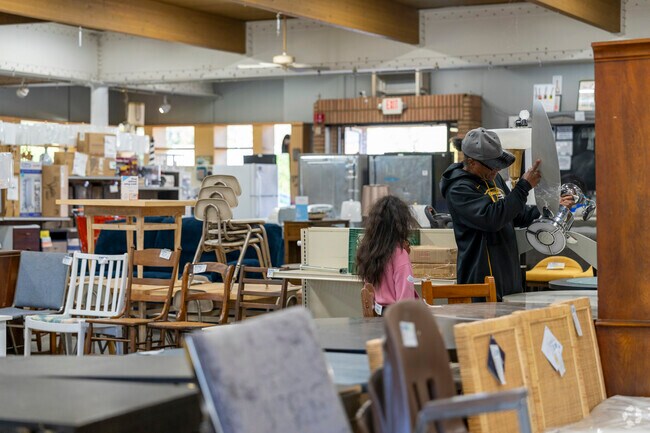 Exchange residents check out the home goods at Habitat ReStore.