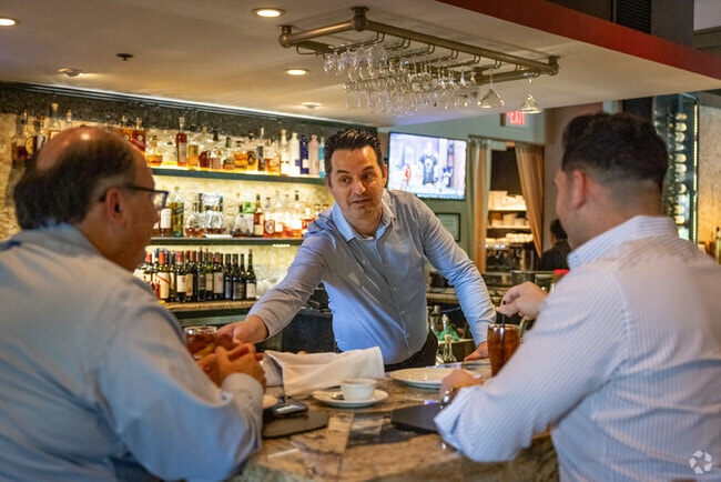 Lithos Estiatorio is a vibrant bar & Greek restaurant serving up high-end Mediterranean cuisine in Roseland.