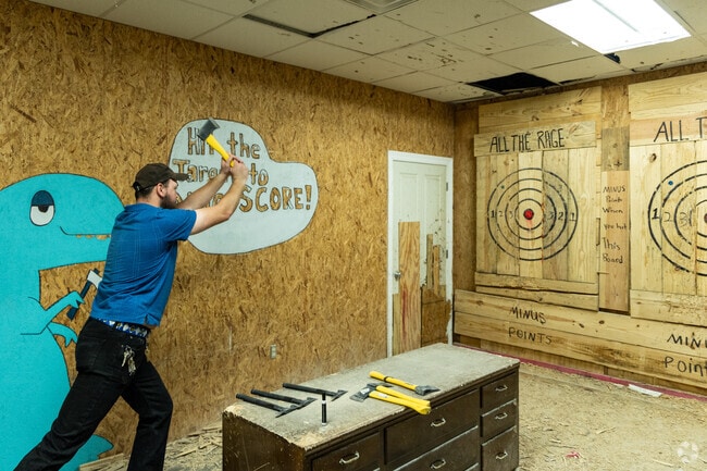 Axe throwing at All the Rage in Lafayette has become a popular pastime for Pilette residents.
