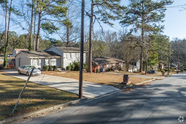 The wide streets of Baker Hills feature towering shade trees.