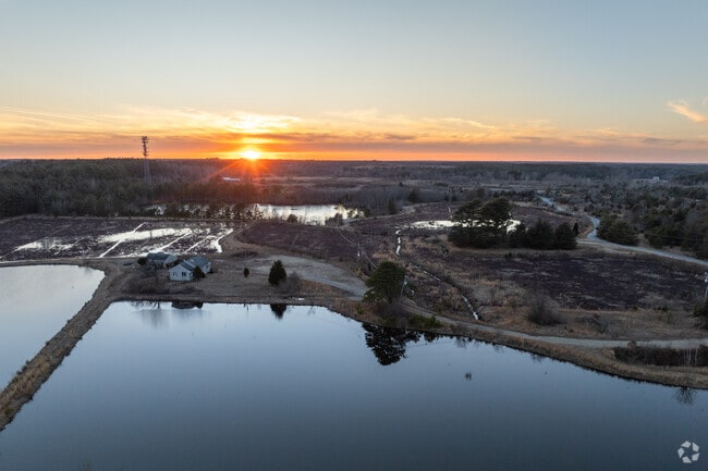 The sun peacefully sets over the bogs of Middleborough.