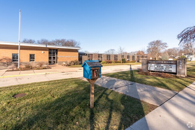 There is a little library in front of Indian Grove Elementary School.