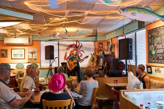 Erika Peterson of Juniper Lawncare performs on stage at the Great Machipongo Clam Shack during a regular live event.