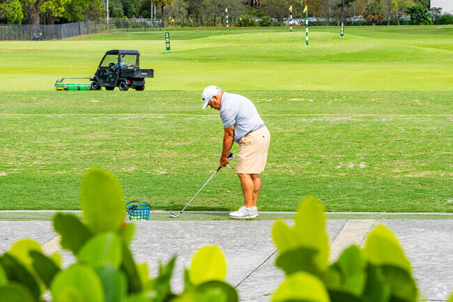 Golfer setting up for the perfect shot in Ranchette neighborhood.