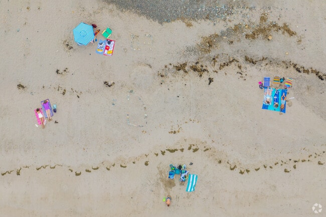 Beachgoers enjoy the Sun at Rexhame Beach in Ocean Bluff-Brant Rock.