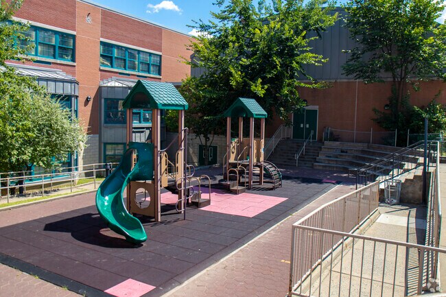 A playground to the right of the school