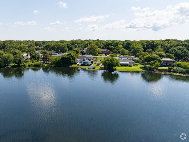 Some homes have water views of Canaan Lake in North Patchogue.