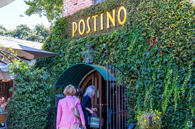 Swing by Postino, a farm-to-table Italian restaurant located inside a historic brick building.