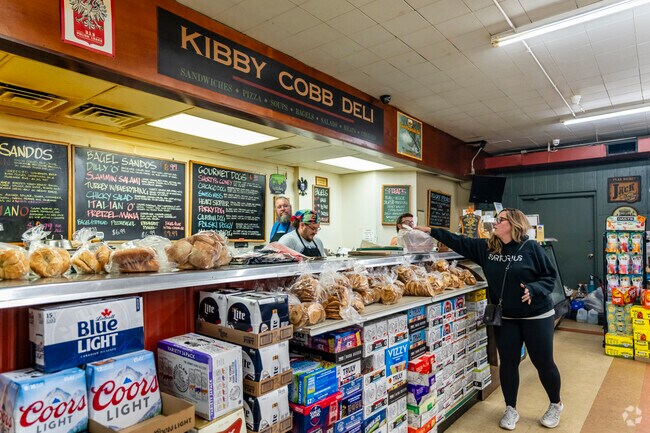 Sandwich makers work hard as they prepare lunches for Parkside locals.
