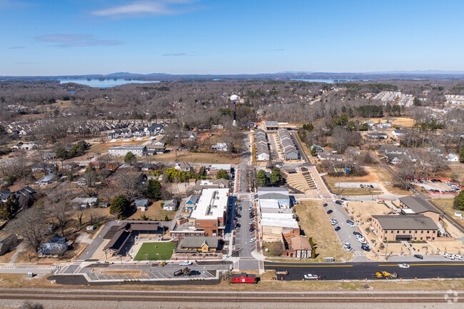 The charming town of Flowery Branch is currently experiencing vibrant growth, expanding its borders to welcome an influx of new residents who are eagerly relocating to this picturesque area.