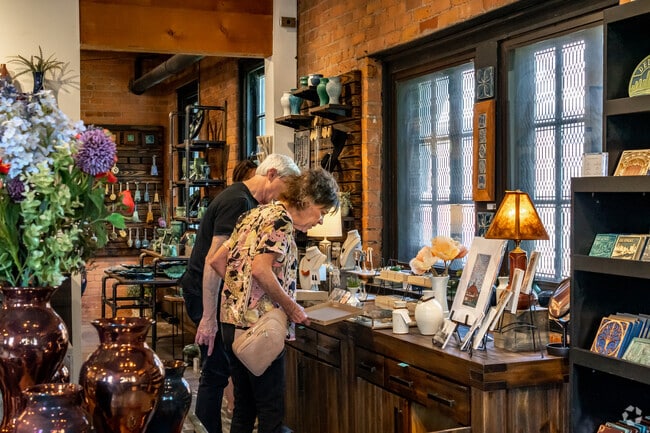 Stop in at Pewabic Pottery to browse their selection of ceramic goods outside Joseph Berry.