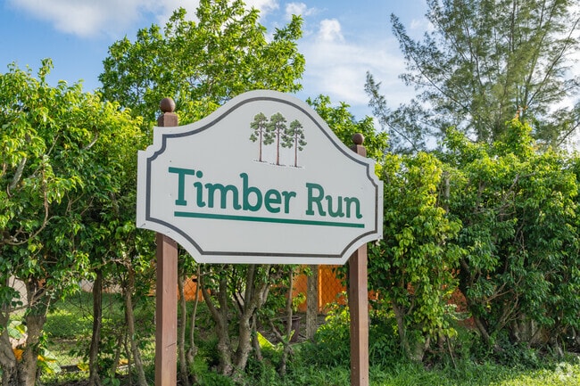 Timber Run signage marks a nearby gated community west of Lake Belvedere Estates.