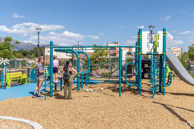 Pueblo Alto residents often combine shopping with fun at the Winrock playground and park.