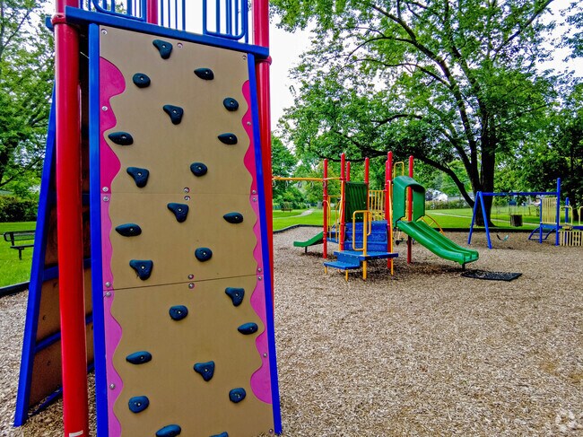 Kids enjoy the playground and the colorful climbing wall at Carl Frye Park in Lincoln Village.