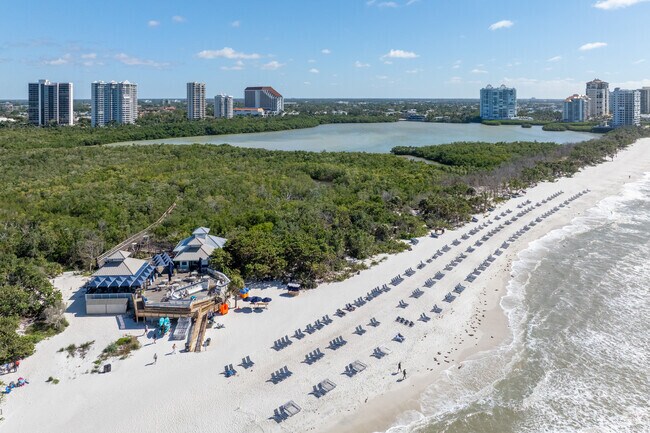 The trams in Pelican Bay will run you out to the beach at Clam Pass.