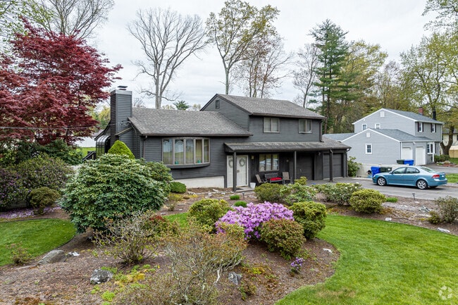 Spacious yards in East Hartford allow residents to grow colorful flowers and lush greenery.