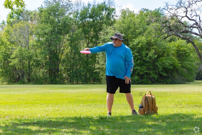 Spring Shadows Park offers playgrounds, trails, and sports facilities for residents to enjoy.