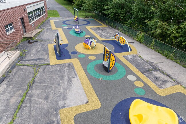 Westbrook Park Elementary School younger students enjoy play time outdoors.