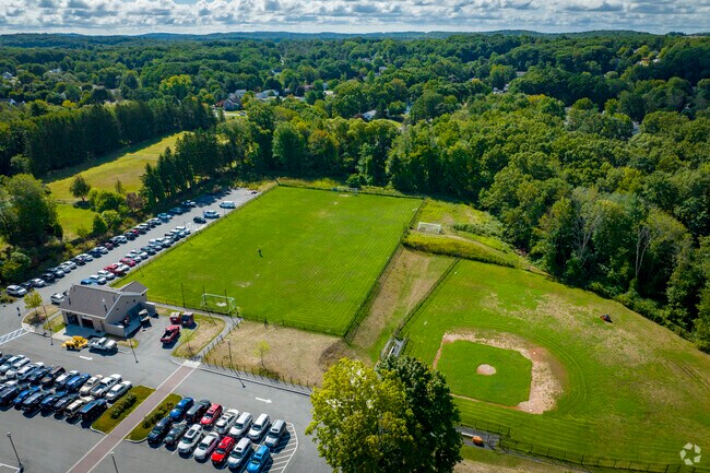 Watch either a soccer or baseball game on the weekends at the 
Caleb Dustin Hunking School.
