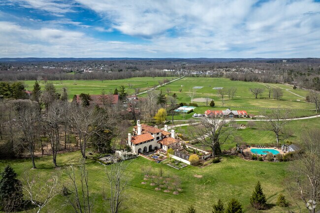 This sprawling private estate in Peapack-Gladstone is surrounded by gorgeous woods and fields.