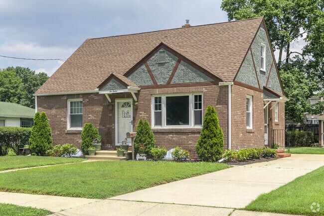 Brick style cape cods sit on private lots nearby to many local parks and schools.