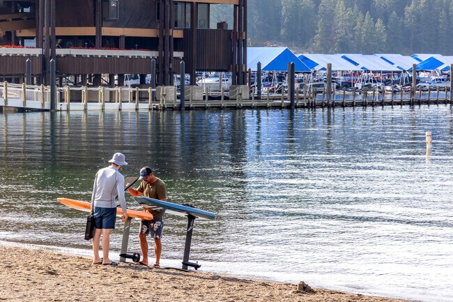 Boardwalk Public Beach is surrounded by Lake Coeur d'Alene on three sides.