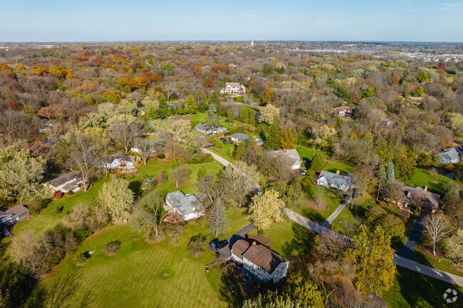 Trout Valley homes are spread out between an abundance of trees and nature.