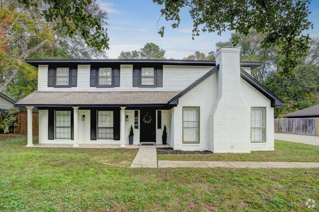 Homes vary, showcasing diverse styles within Woodloch's small town.