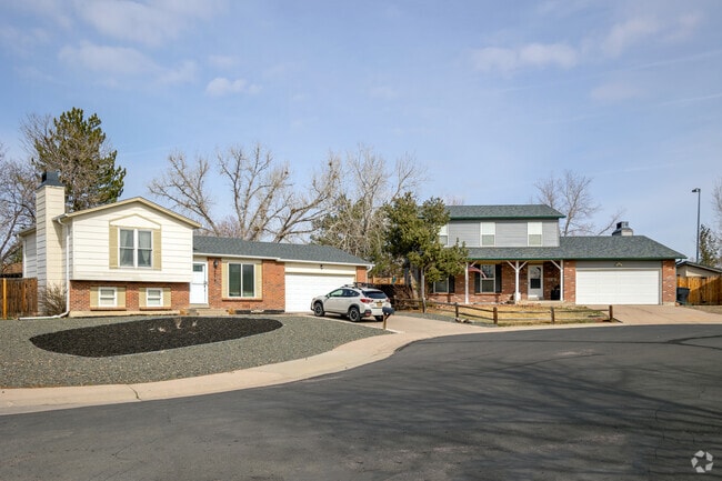 Homes in the Grange Creek neighborhood were built in the 1970s with board-and-batten exteriors, oriel-style bay windows and multi-car attached garages.
