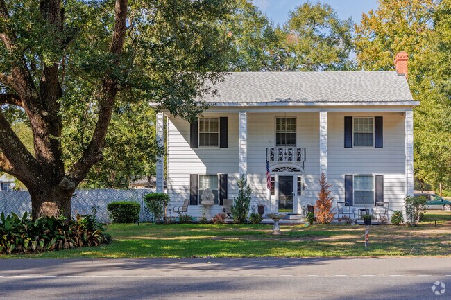 Two story traditional farmhouse home in Logansport.