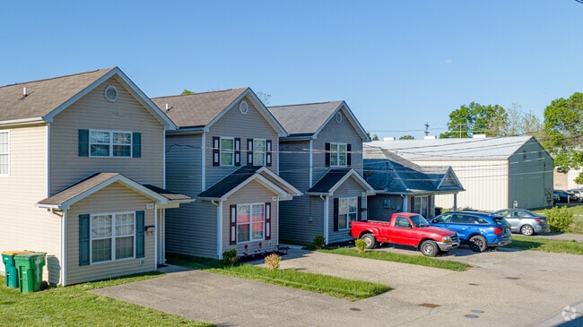 Townhome style homes sit alongside of Cottage style homes in the neighborhood of West Buechel.